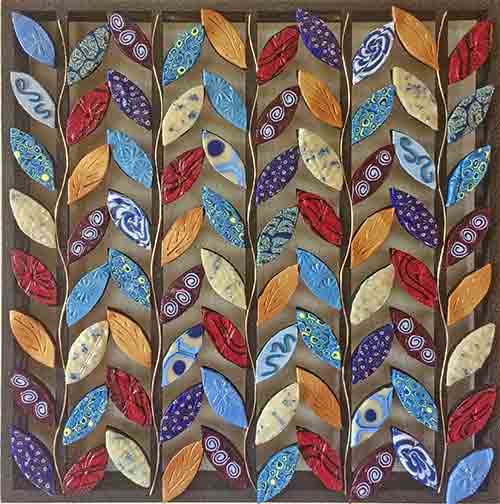 Linda Martin leans into her first wall art and is surprised on PolymerClayDaily Linda Martin leans into her first wall art and is surprised on PolymerClayDaily
