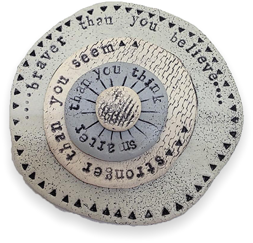 Wendy Moore stamps wisdom into clay on PolymerClayDaily Wendy Moore stamps wisdom on a brooch on PolymerClayDaily